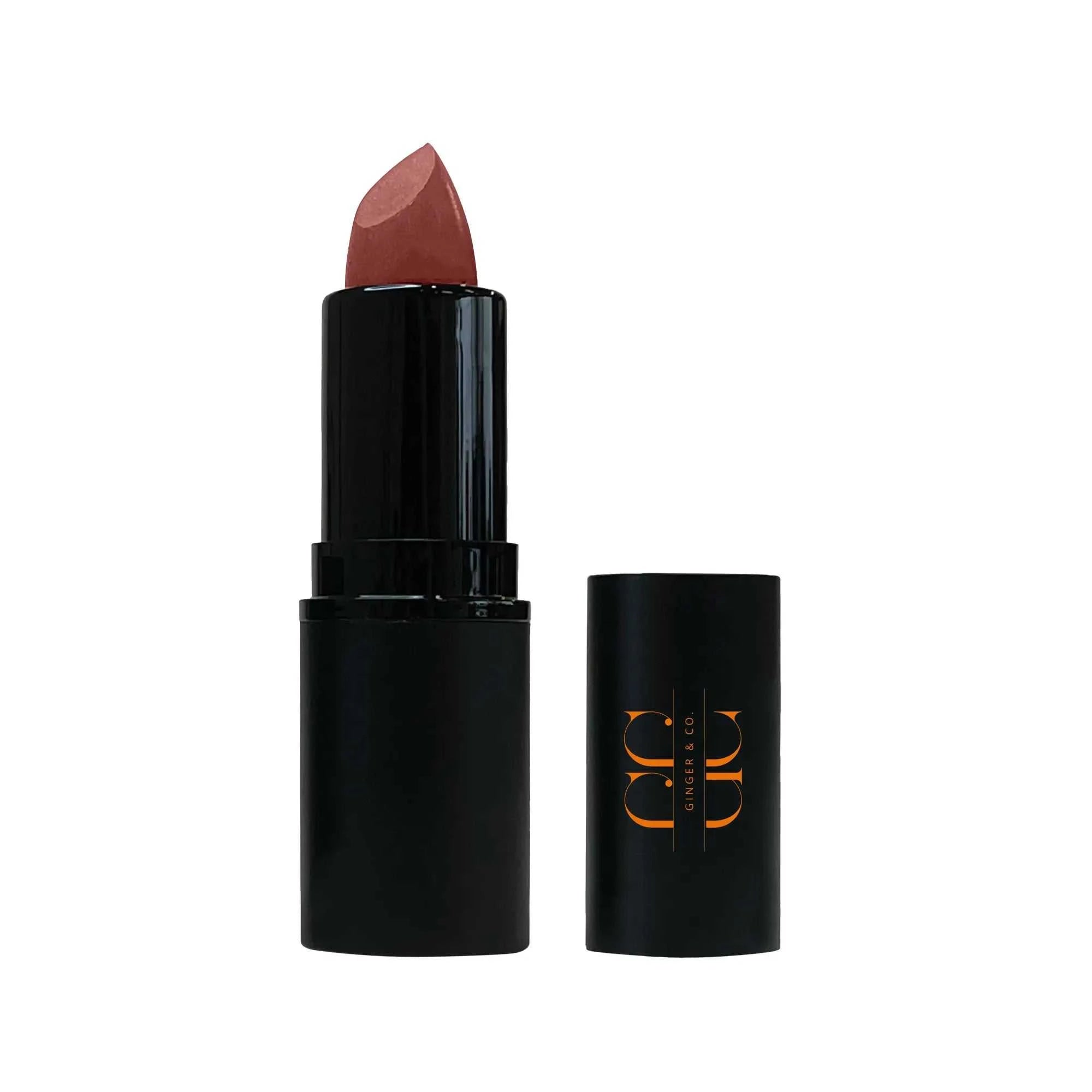 Perfect Plum lipstick tube with hydrating beeswax and jojoba oils on a white background