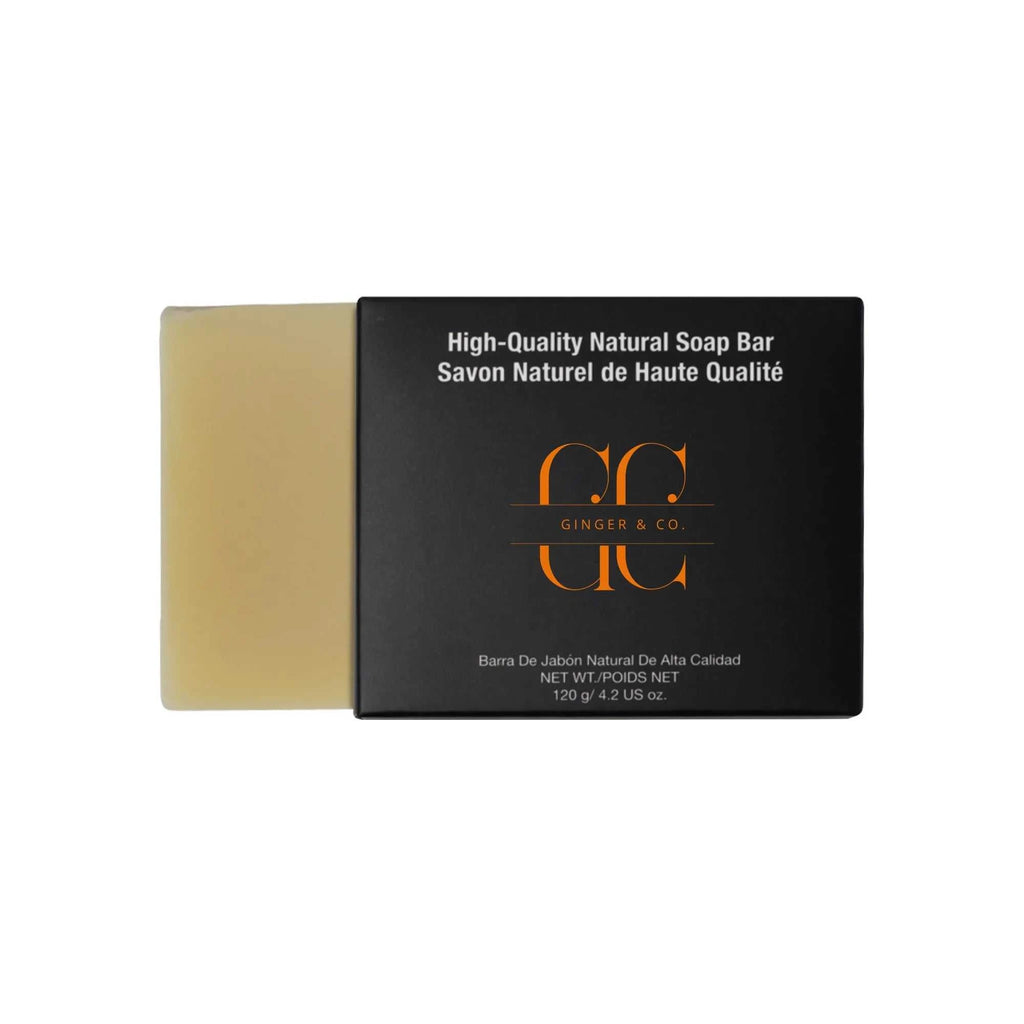 Natural soap bar with organic ingredients including turmeric, neem, basil, and coconut oil